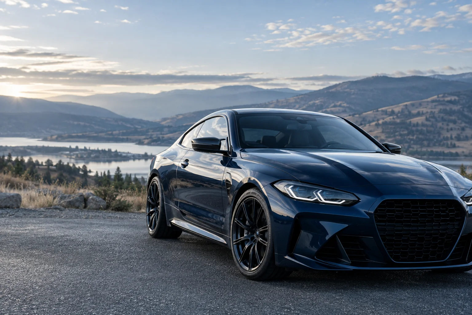 Illustrative image of a polished dark coupe overlooking an Okanagan lake